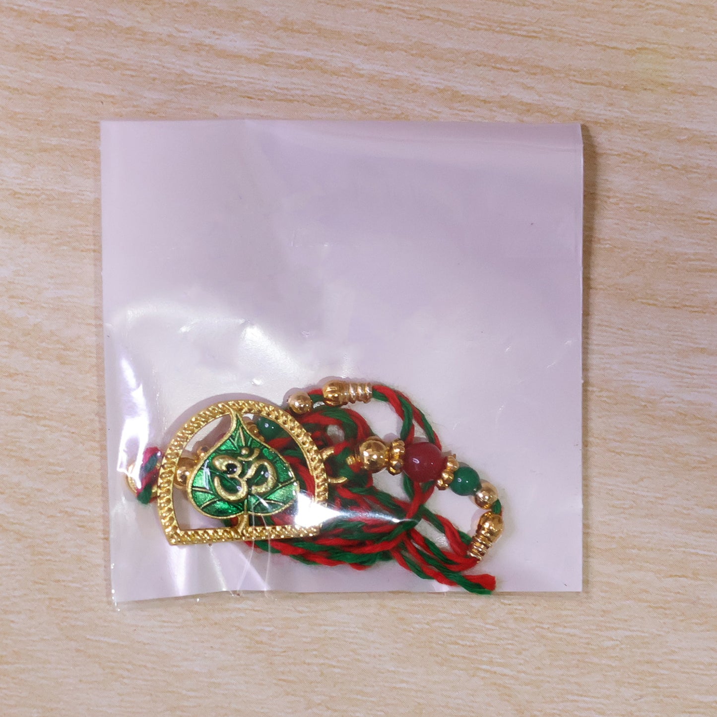 Divine Rakhi with Om Arch Plaque, leaf detail and display look for Festive Display