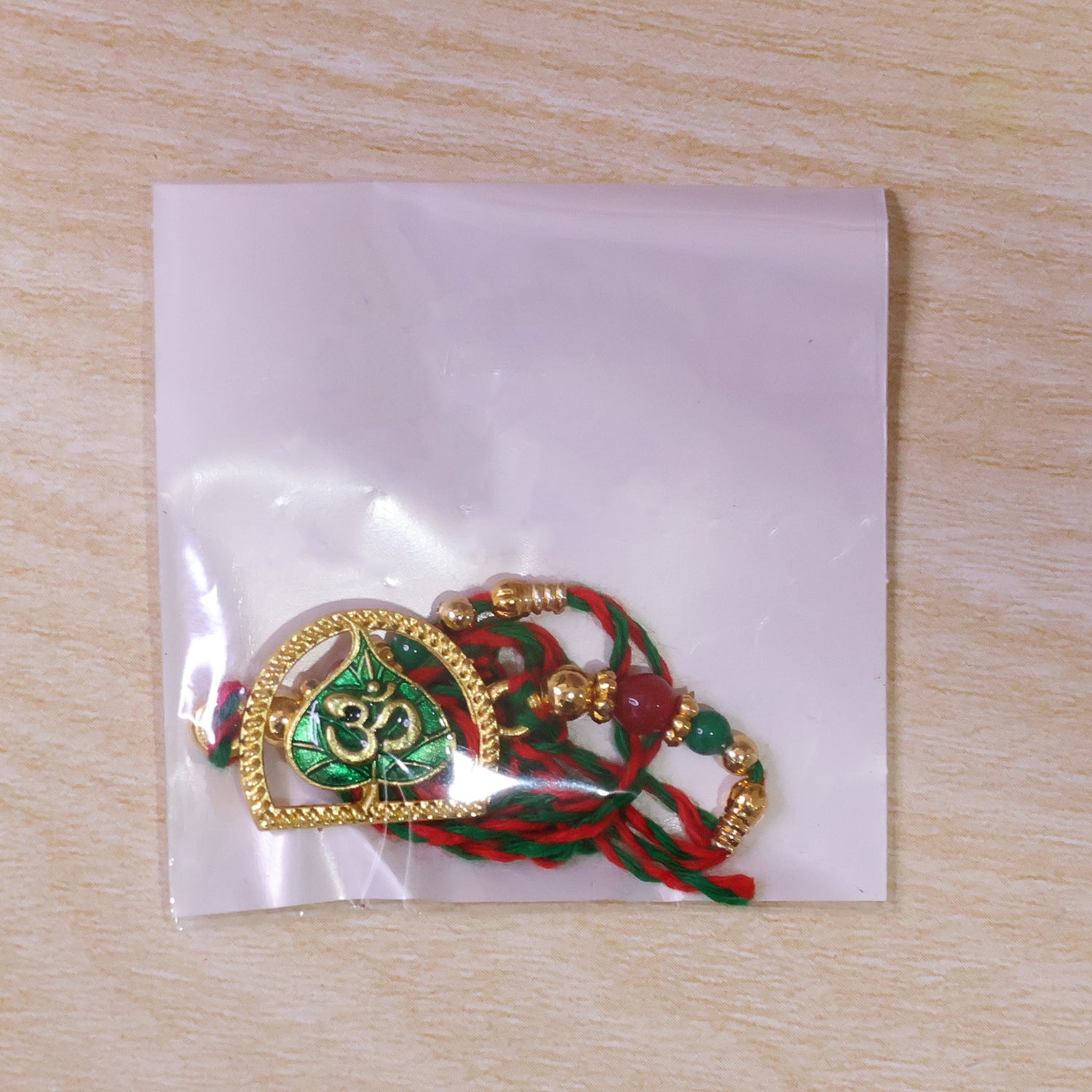 Divine Rakhi with Om Arch Plaque, leaf detail and display look for Festive Display