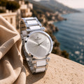 Silver Round Shape Dial Watch with White Metal Strap Design for Women