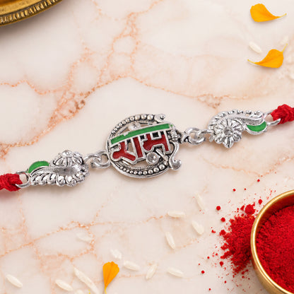 Silver-Toned Ram Rakhi with Red & Green Enamel and Crystal Accents for Brother