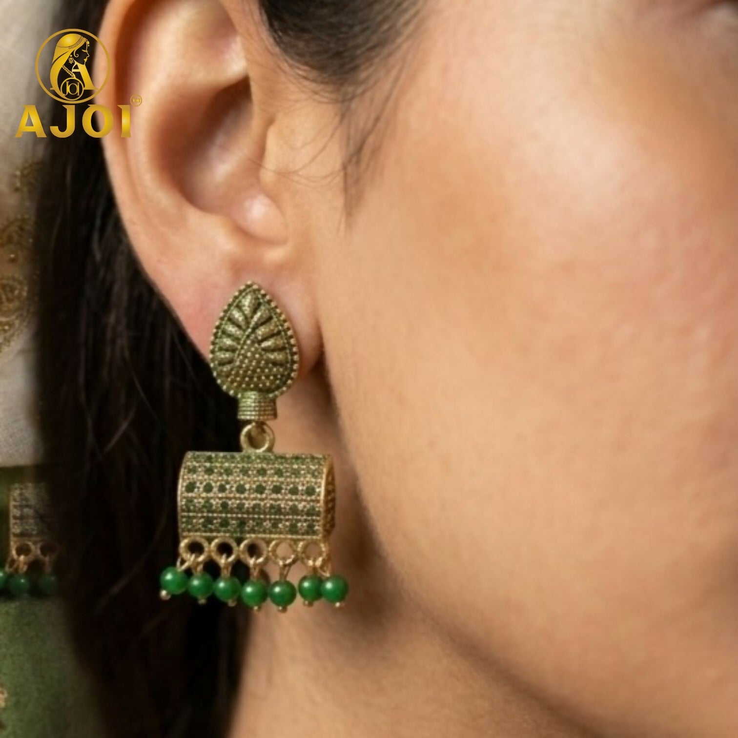 Antique Gold-Plated Leaf Design Jhumka Earrings with Green Bead Drops