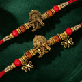 Flute Peacock Feather Rakhi Set with Wooden Beads for Festive Couple Gift Giving