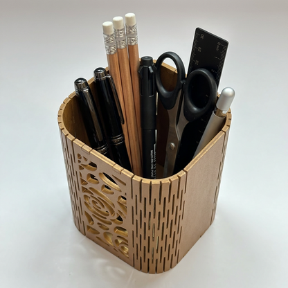 View of the cylindrical MDF pen stand from above, showing the neat arrangement of stationery.