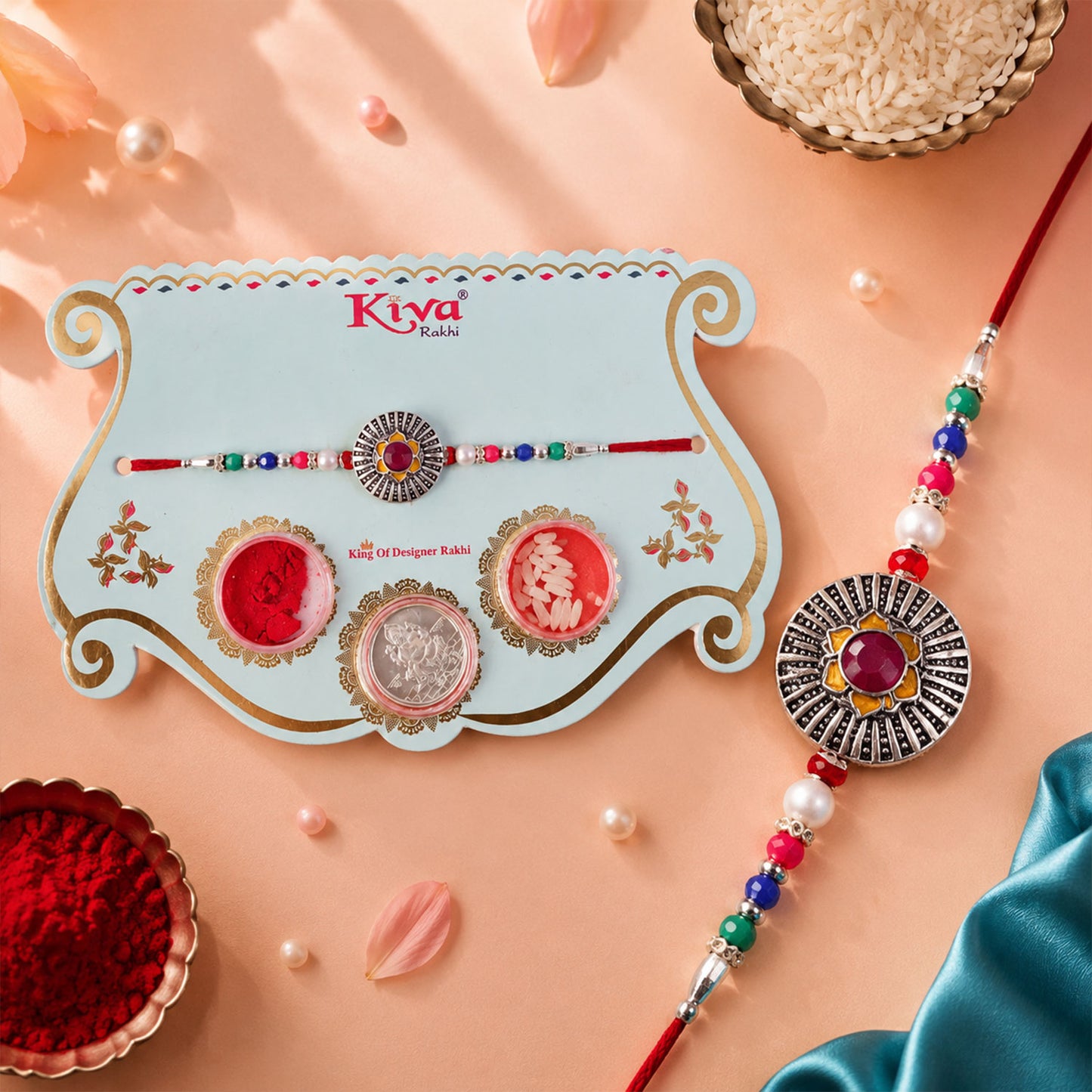 Sunburst Stone Rakhi with Magenta Centre, Pearl Beads, Roli Chawal Coin and Card Packing