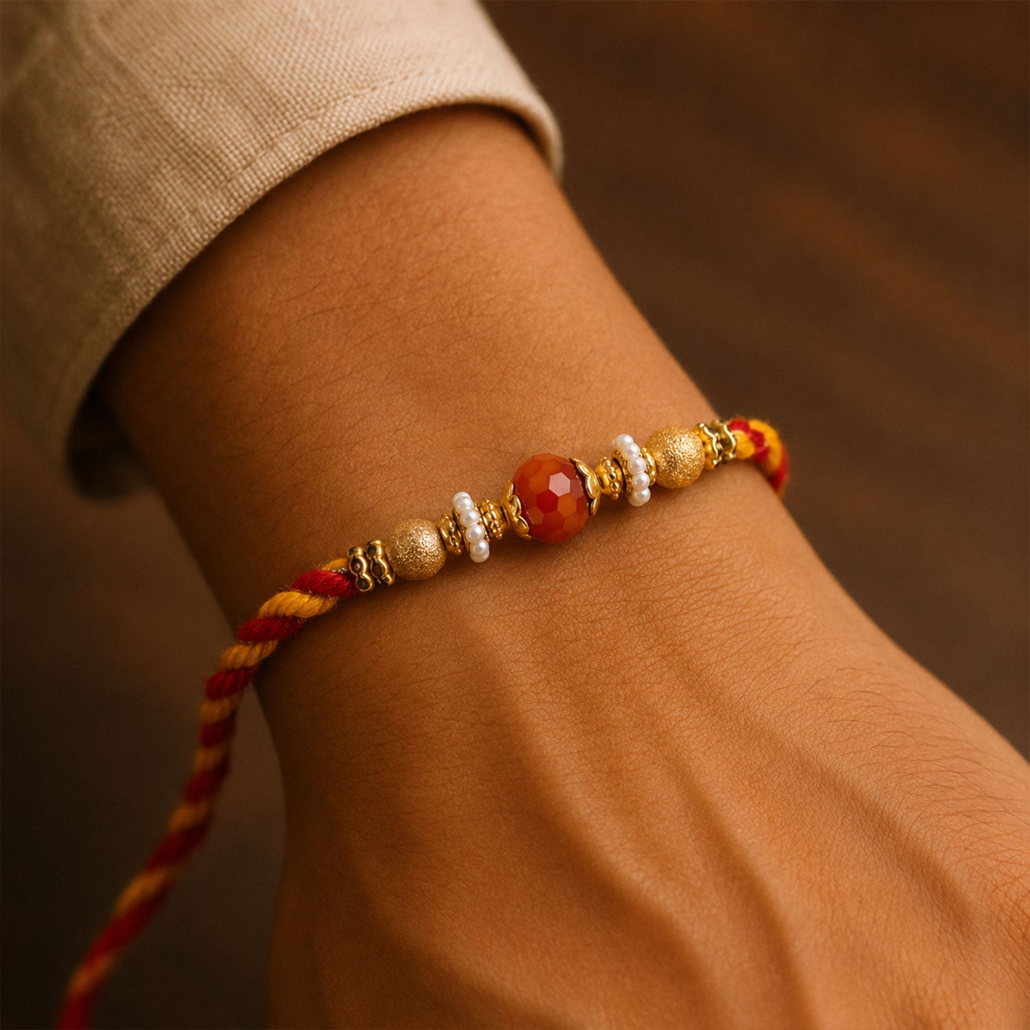 Beautiful Pearl Bead Rakhi with Soft Festive Shades and Elegant Designer Look