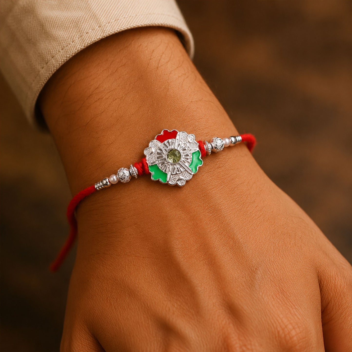 Green White Flower Rakhi with Silver Beads and Red Thread