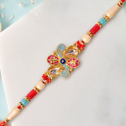 Jewel Floral Rakhi with Red Blue Beads and Bright Traditional Celebration Styling