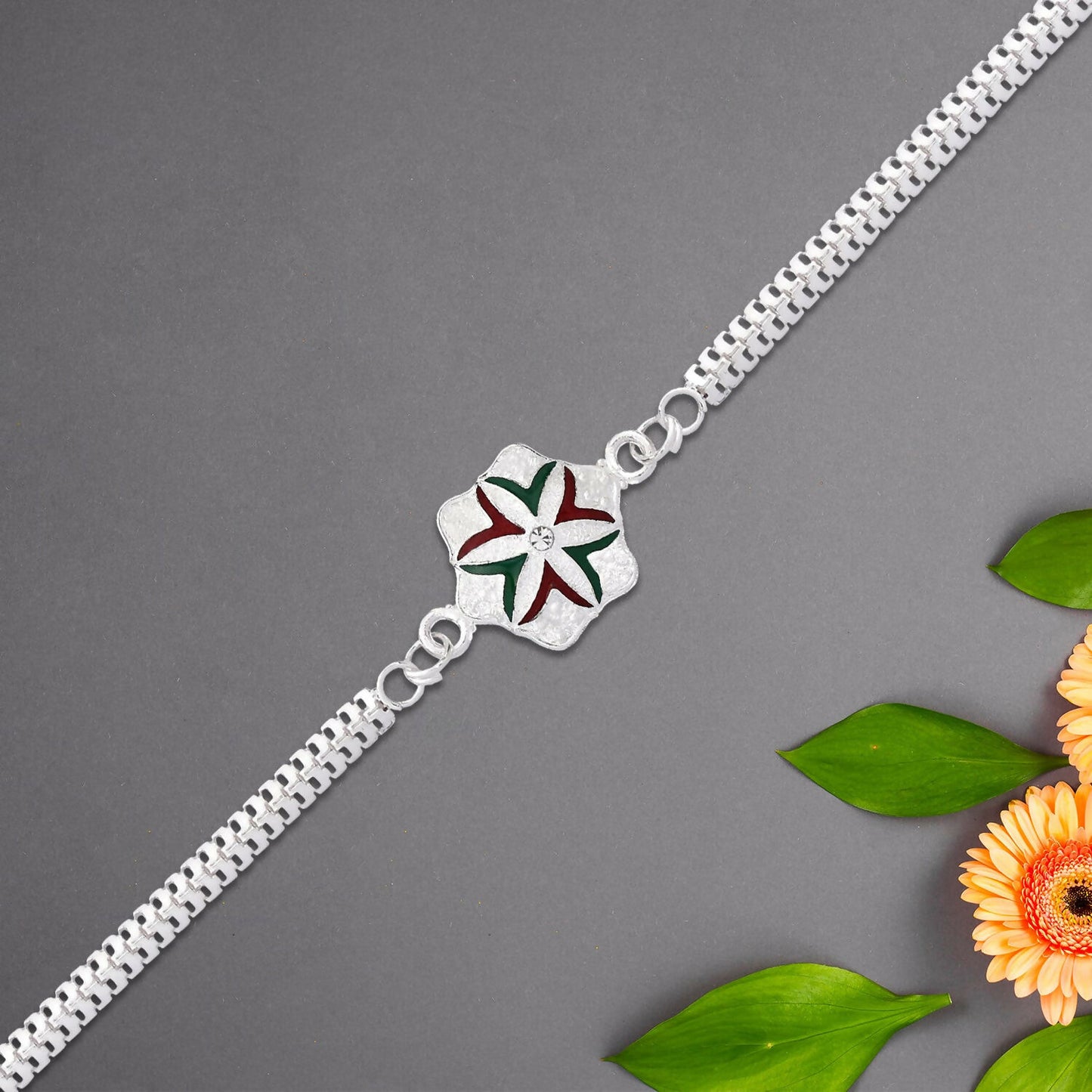Handcrafted flower rakhi showing intricate design and silver chain