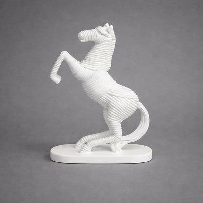 Side view of modern abstract rearing horse sculpture for home decor