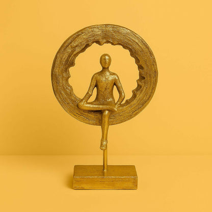 Close-up of golden meditation figurine with premium metallic finish