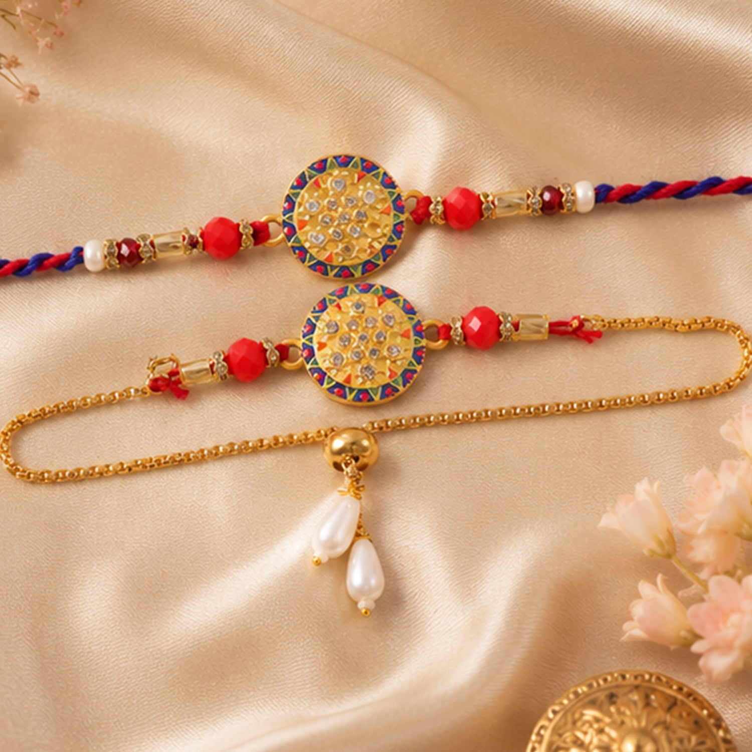 Stone Studded Round Bhai Bhabhi Lumba Rakhi with Pearl Hangings