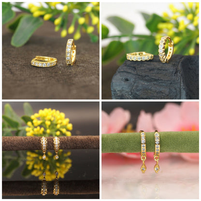 Gold-plated huggie hoop earrings with Cubic Zirconia drop charm, front view