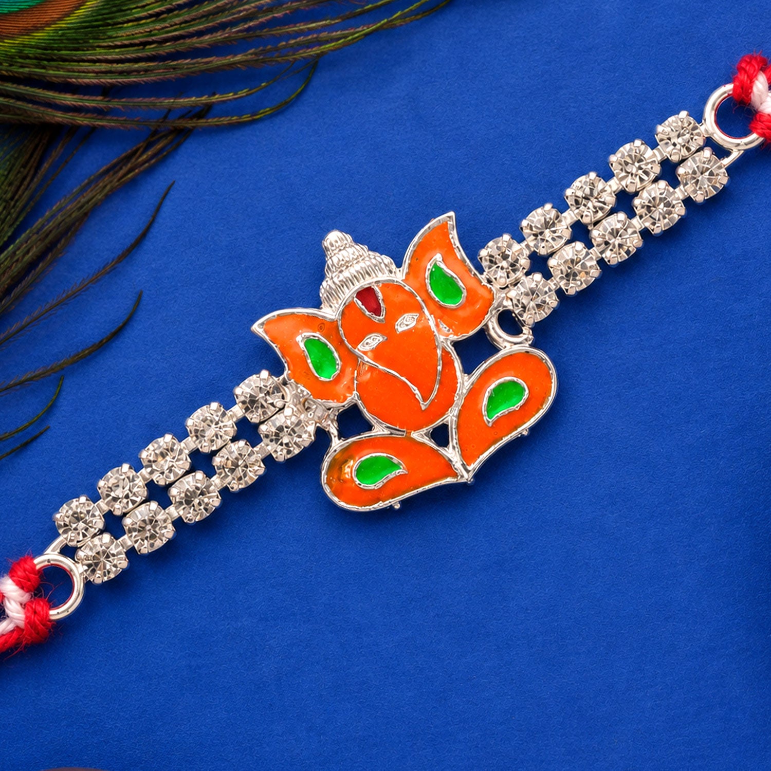 Silver-Toned Lord Ganesha Rakhi with Orange-Green Enamel, Double Crystal Chain & Red Thread