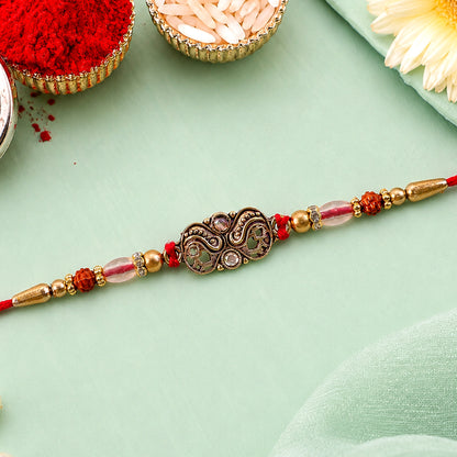 Oxidized Gold Paisley Medallion Rakhi with Rudraksha and Pearl Beads