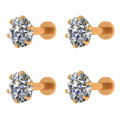 Set of four 14K gold diamond nosepins showcasing minimalist design
