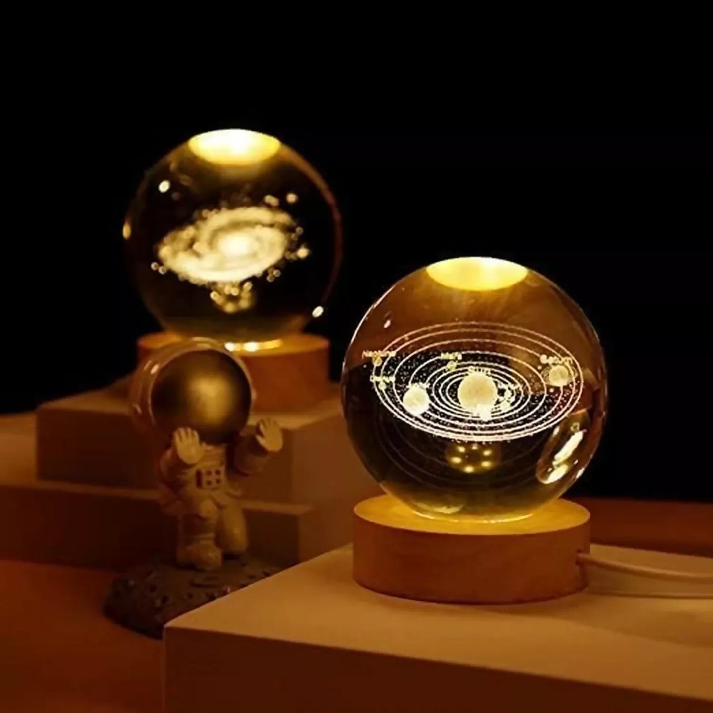 Close-up view of solar system design inside crystal ball lamp