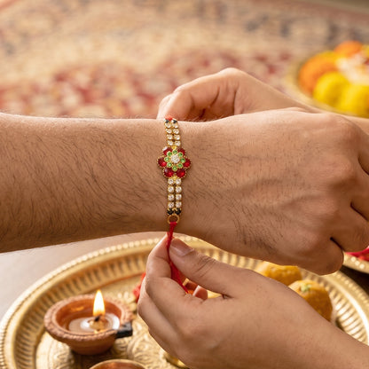 Red Floral Kundan Bracelet Rakhi with Crystal Line and Pearl Ends