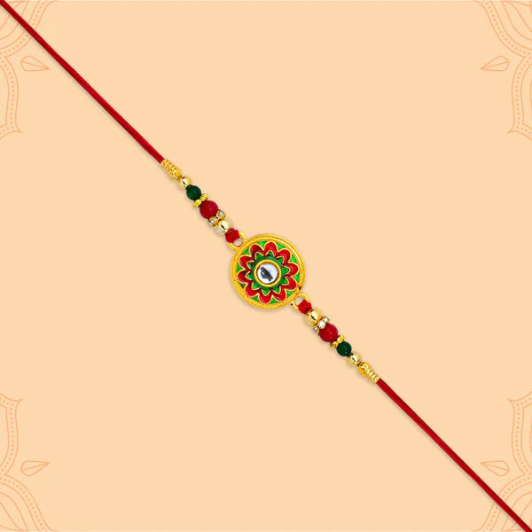 Kundan Rakhi for Brother displayed on a festive background for Raksha Bandhan.