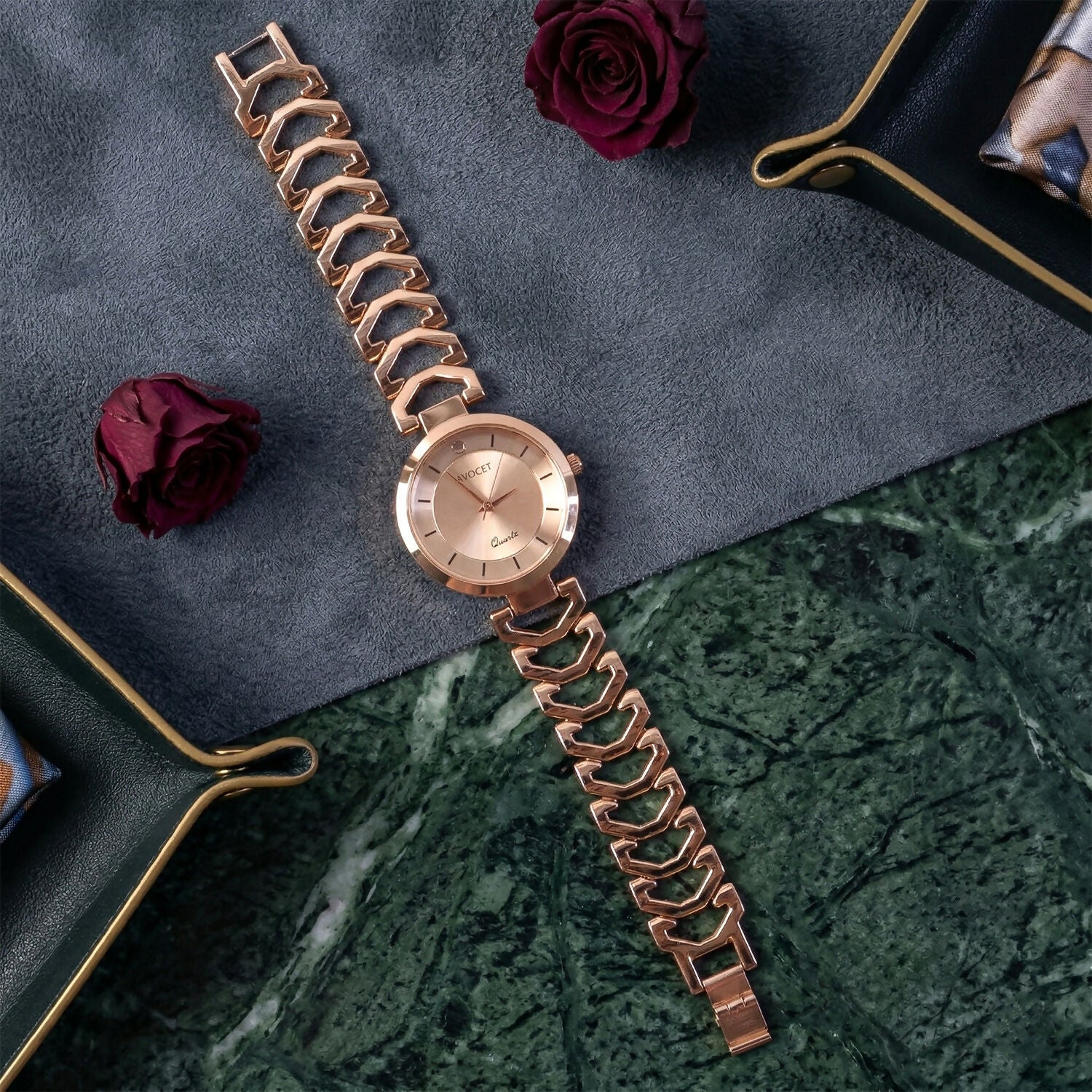 Rose gold watch dial showing minimal design
