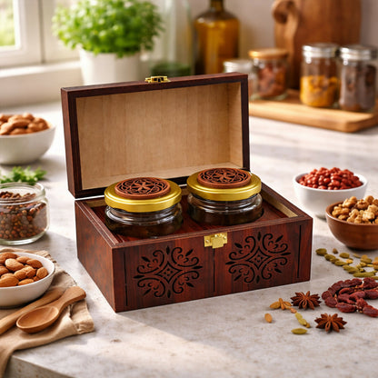 Close-up of wooden box latch and detailed carved wooden patterns with airtight glass jars inside