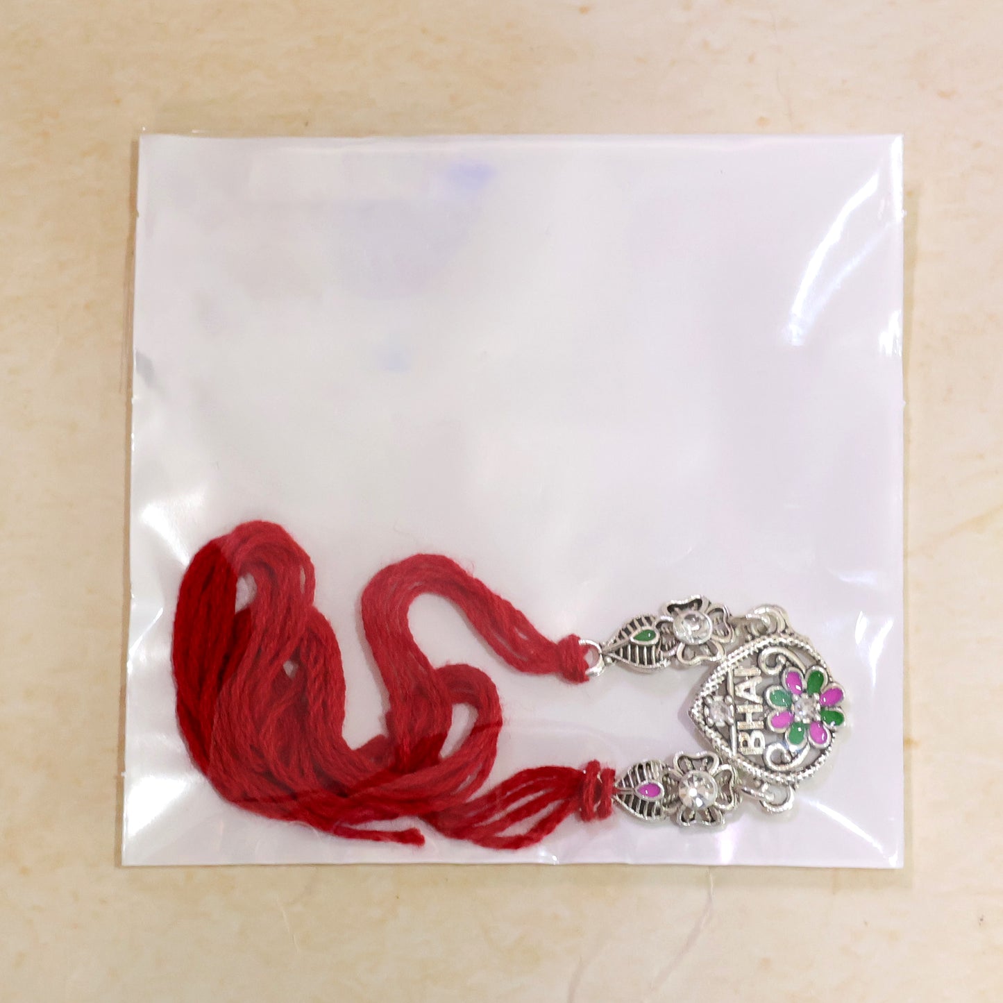 Elegant Rakhi with BHAI Text Plaque, crystal accents and gift style for Gift Styling