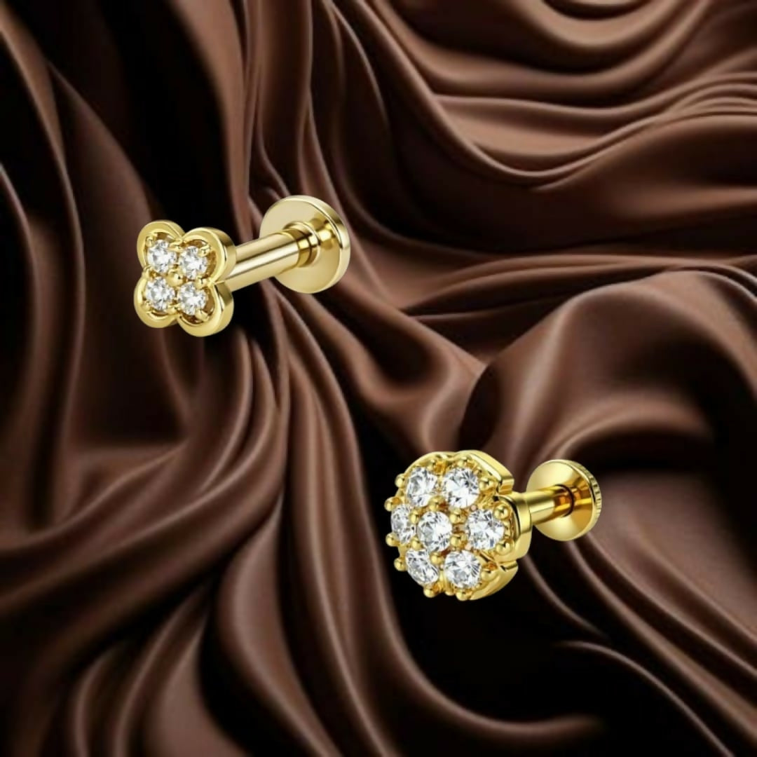 Close-up of gold plated floral clover nose piercing stud with pavé-set CZ stones
