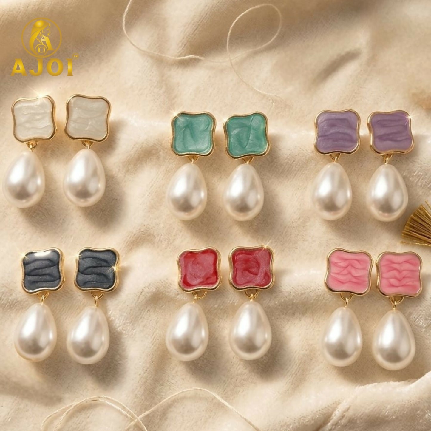 Pearl drop earrings with soft pastel enamel and gold detailing