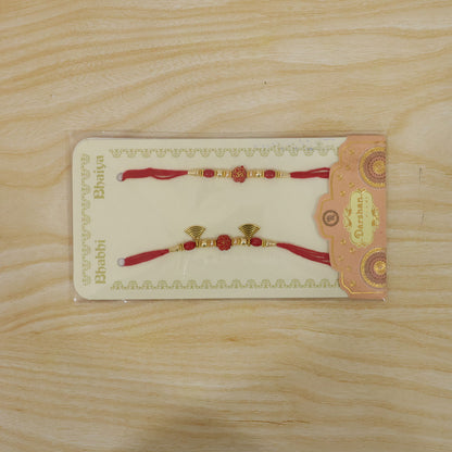 Bhai Bhabhi Floral Charm Rakhi Set with Red Thread, Gold Beads and Black Fan Drops