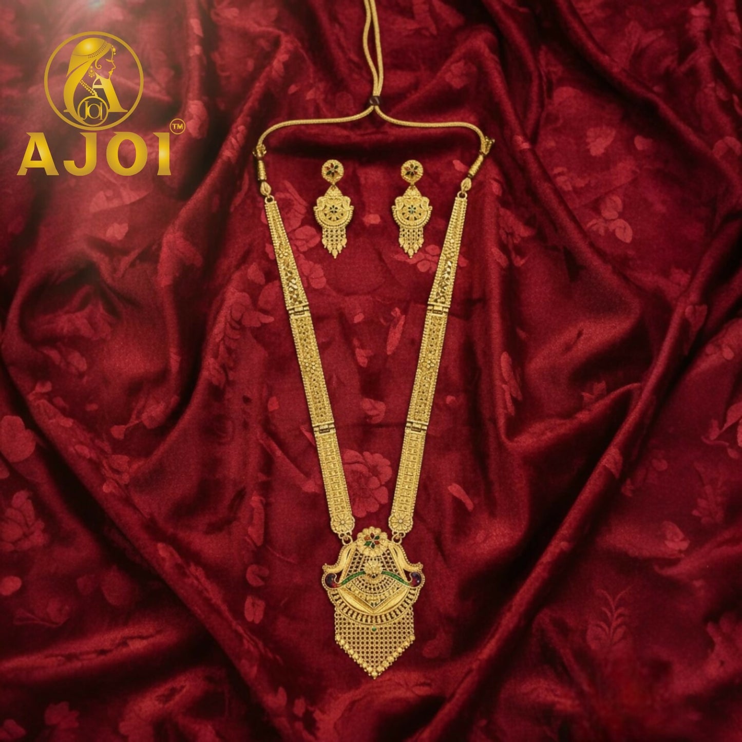 Long structured gold filigree necklace featuring majestic temple motif pendant