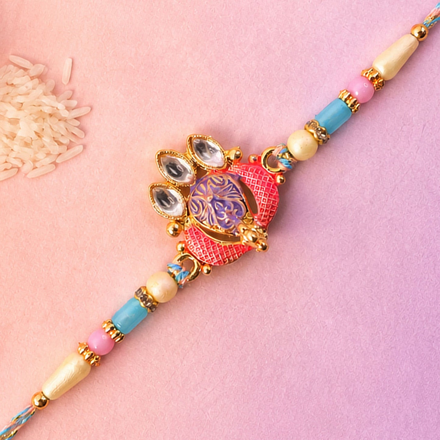Coral Enamel Medallion Pendant Rakhi with Kundan Teardrop Stones