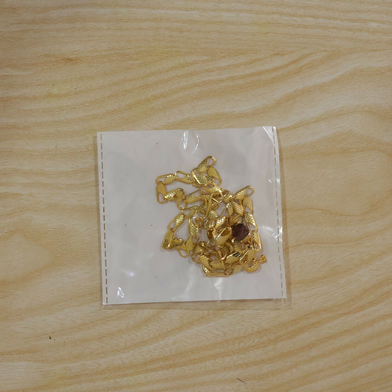 Intricate gold pendant featuring Mor Pankh and Rudraksha bead for religious occasions