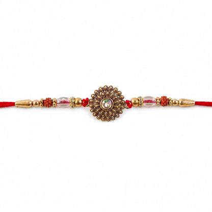 Oxidized Gold Floral Sunburst Pendant Rakhi with Rudraksha and Pearl Beads