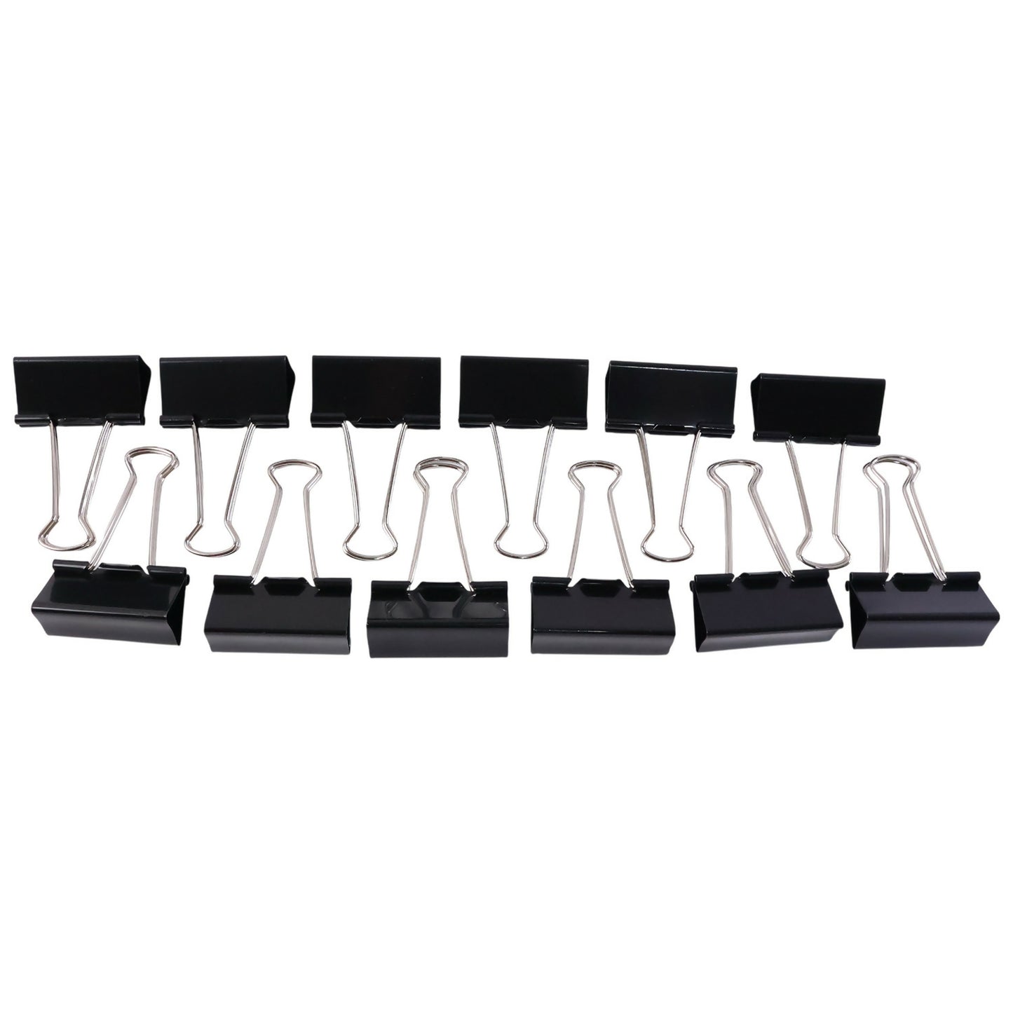Multiple black binder clips on a desk organizer