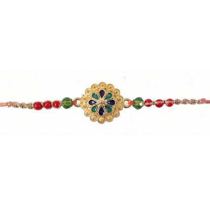 Gold Blue Flower Rakhi with Green Beads and Red Pearl Accents
