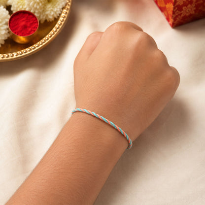 Peach-Turquoise Twisted Cord Rakhi with Beadless Pastel Design