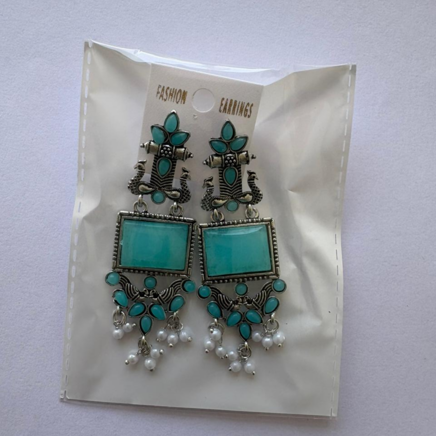 Vintage style oxidized silver earrings with rectangular blue centerpiece and pearl drops