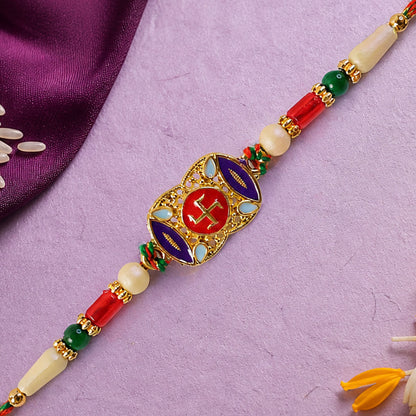 Festive Rakhi featuring Swastik Medallion and gold trims in display look for Gift Use