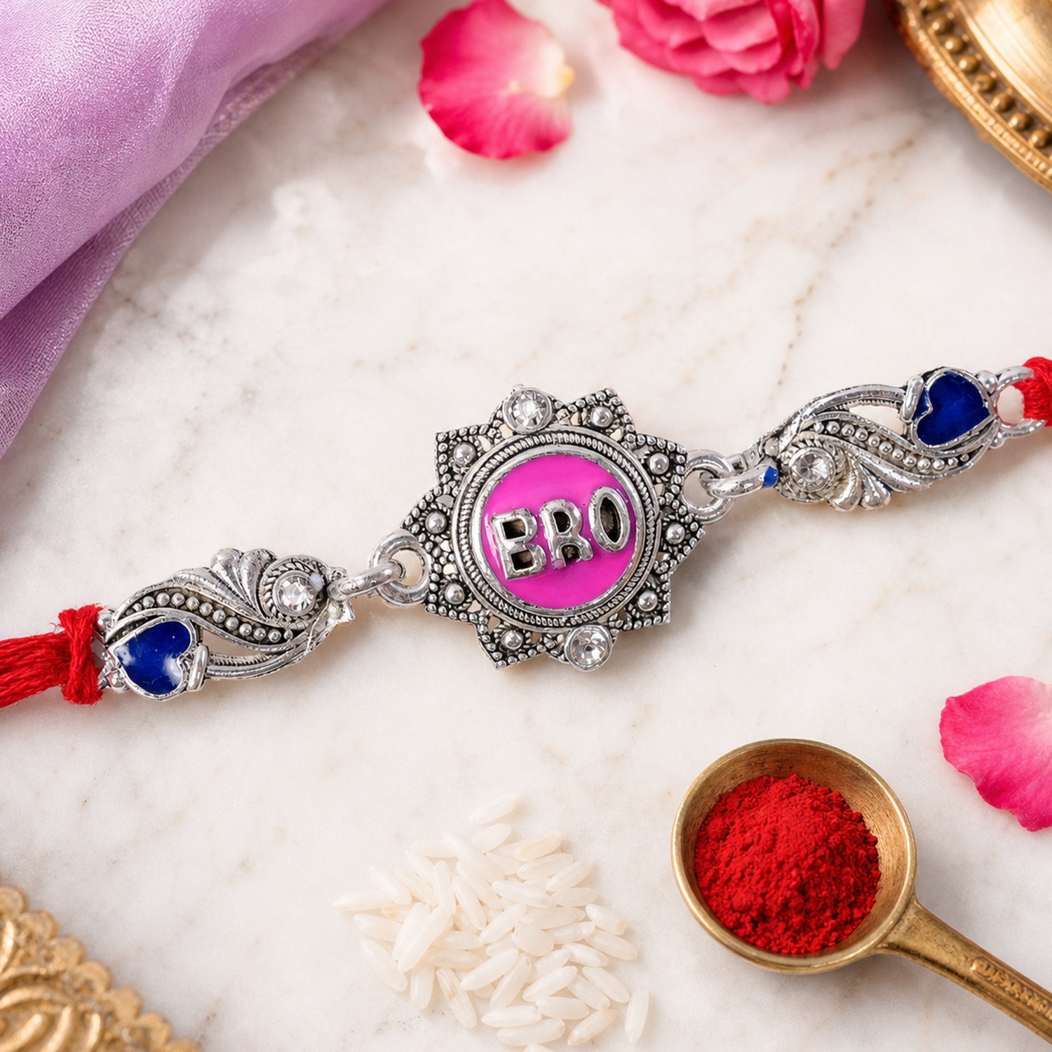 Silver-Toned BRO Rakhi with Pink Enamel, Blue Heart Accents, Crystals & Red Thread