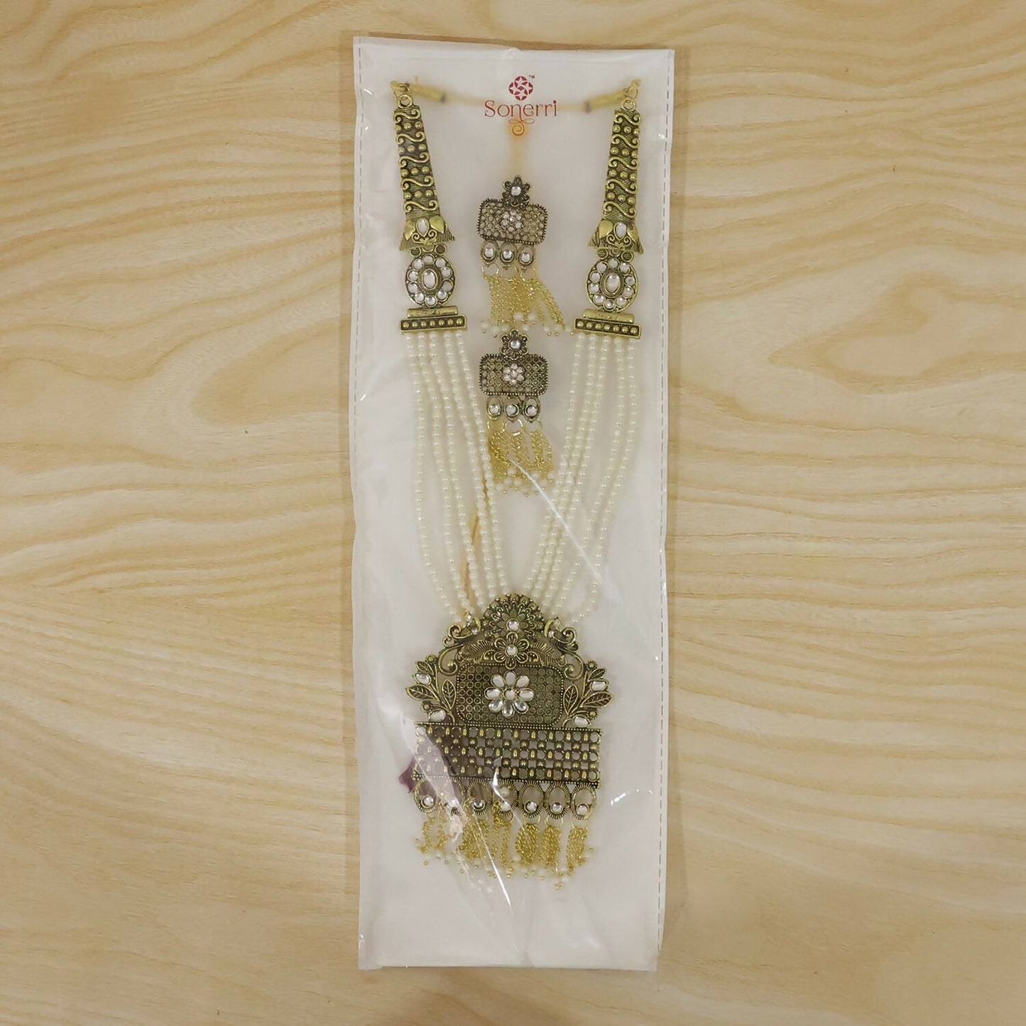 Traditional pearl necklace set styled for festive wear