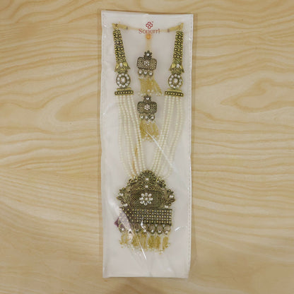 Traditional pearl necklace set styled for festive wear