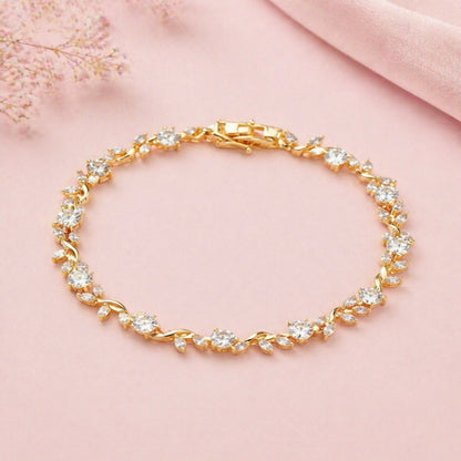 Close-up of crystal-studded vine design on bracelet