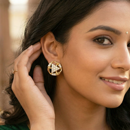 Elegant gold earrings featuring bell shape and detailed craftsmanship