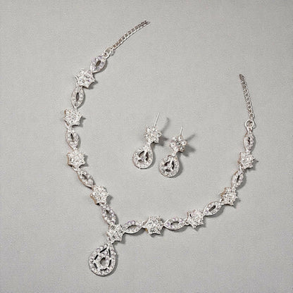 Close-up of leaf motif and pearl drop detail