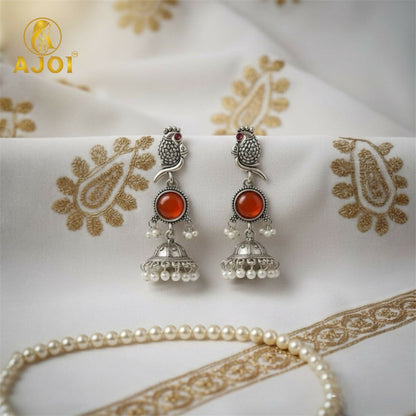 Antique Silver Peacock Jhumka Earrings with Red Stone Centerpiece & Pearl Drops