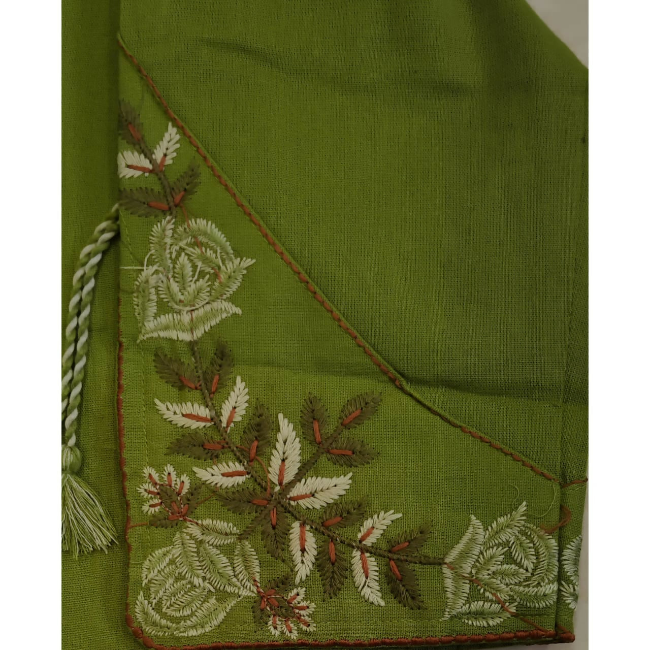 Front view of women’s dark green short kurta with embroidery and sleeve details
