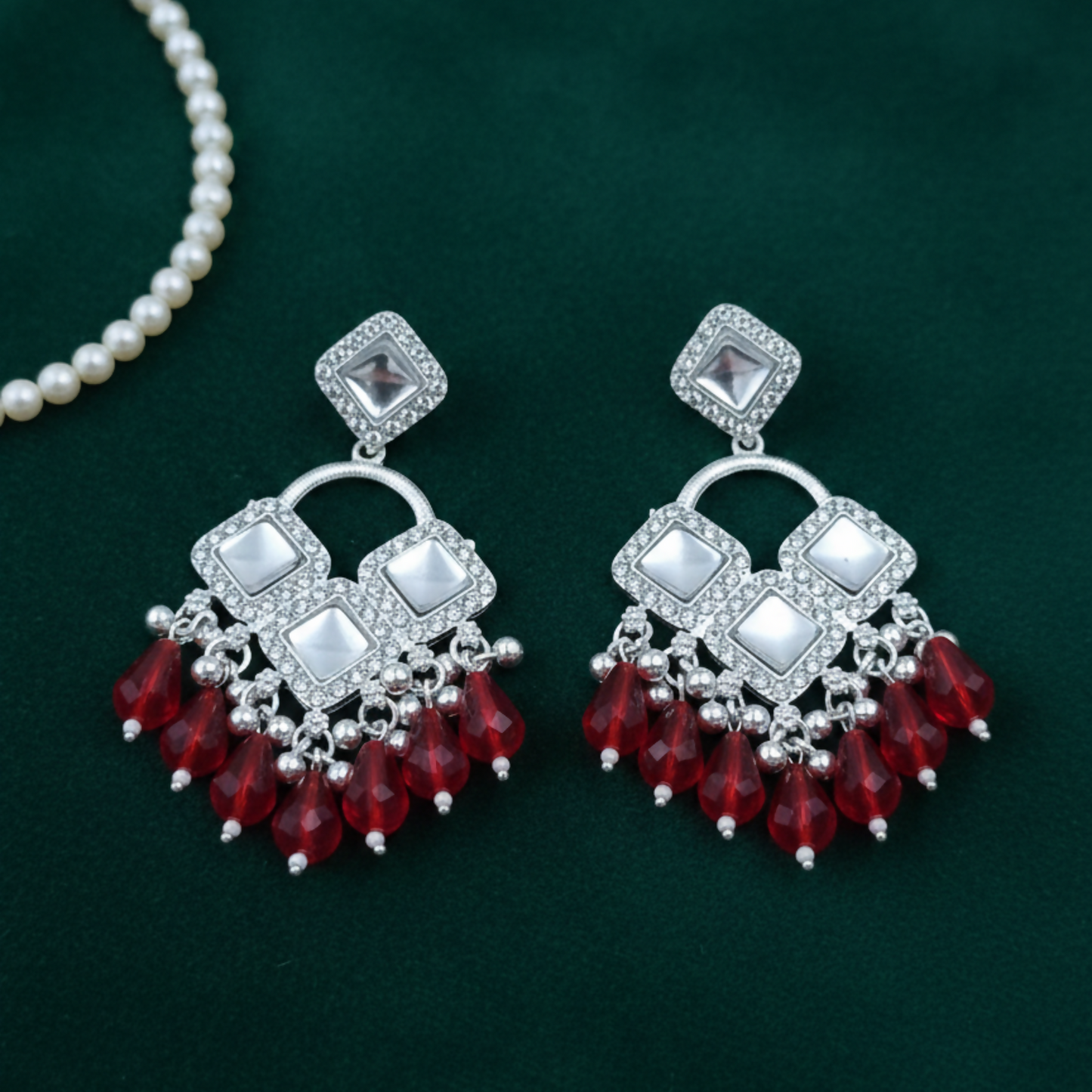 Elegant Silver Plated Chandelier Earrings Featuring Square Crystals and Red Teardrop Beads
