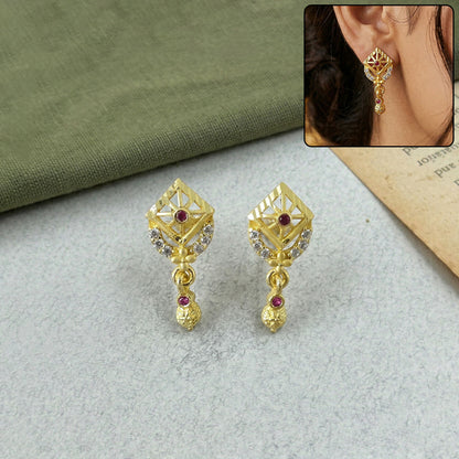 Gold plated ethnic drop earrings with intricate leaf pattern and stone accents