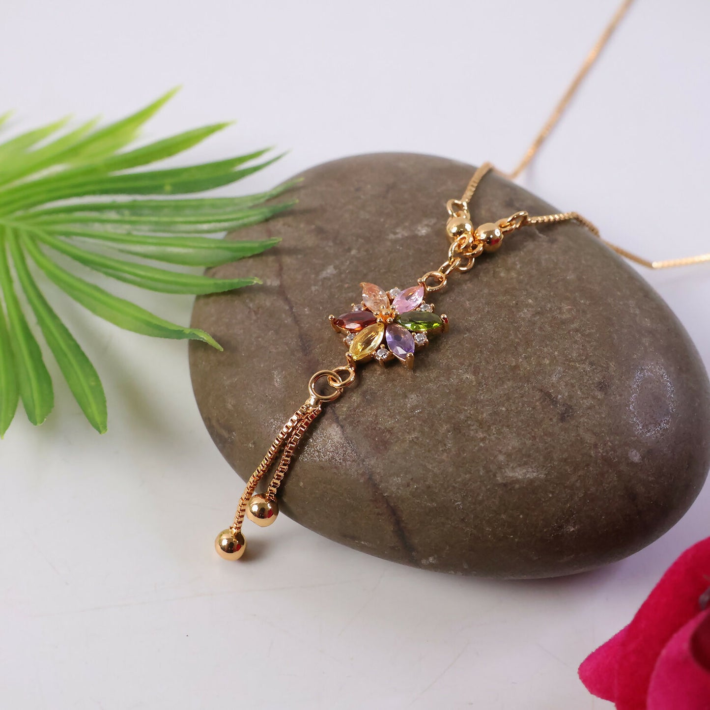 Tassel drop with bead ends on multicolor crystal flower necklace