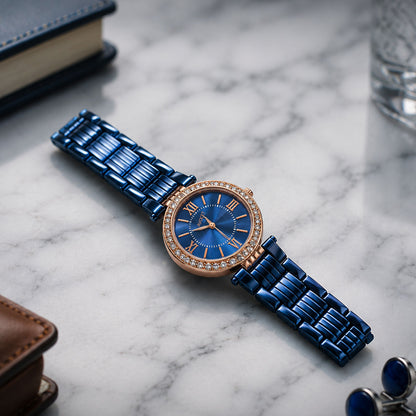 Stylish women's blue analog watch adorning a wrist, showcasing its elegant design.