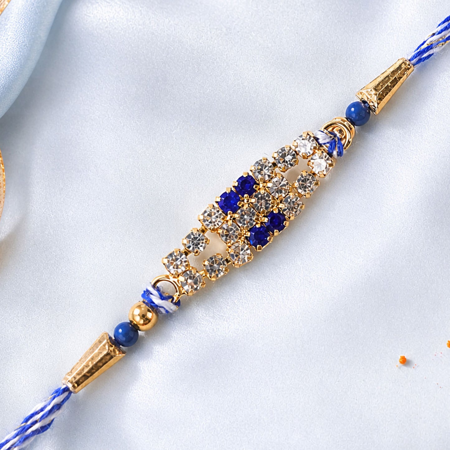 Long Oval Centre Motif Rakhi in Mix Colour Threads (Pack of 6)